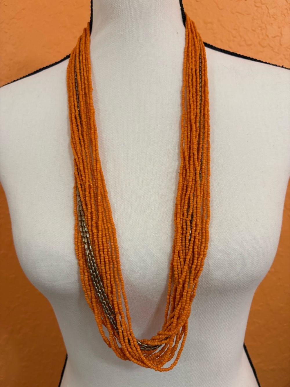Multi-Strand Orange Seed Bead Necklace with Subtle Metallic Accent